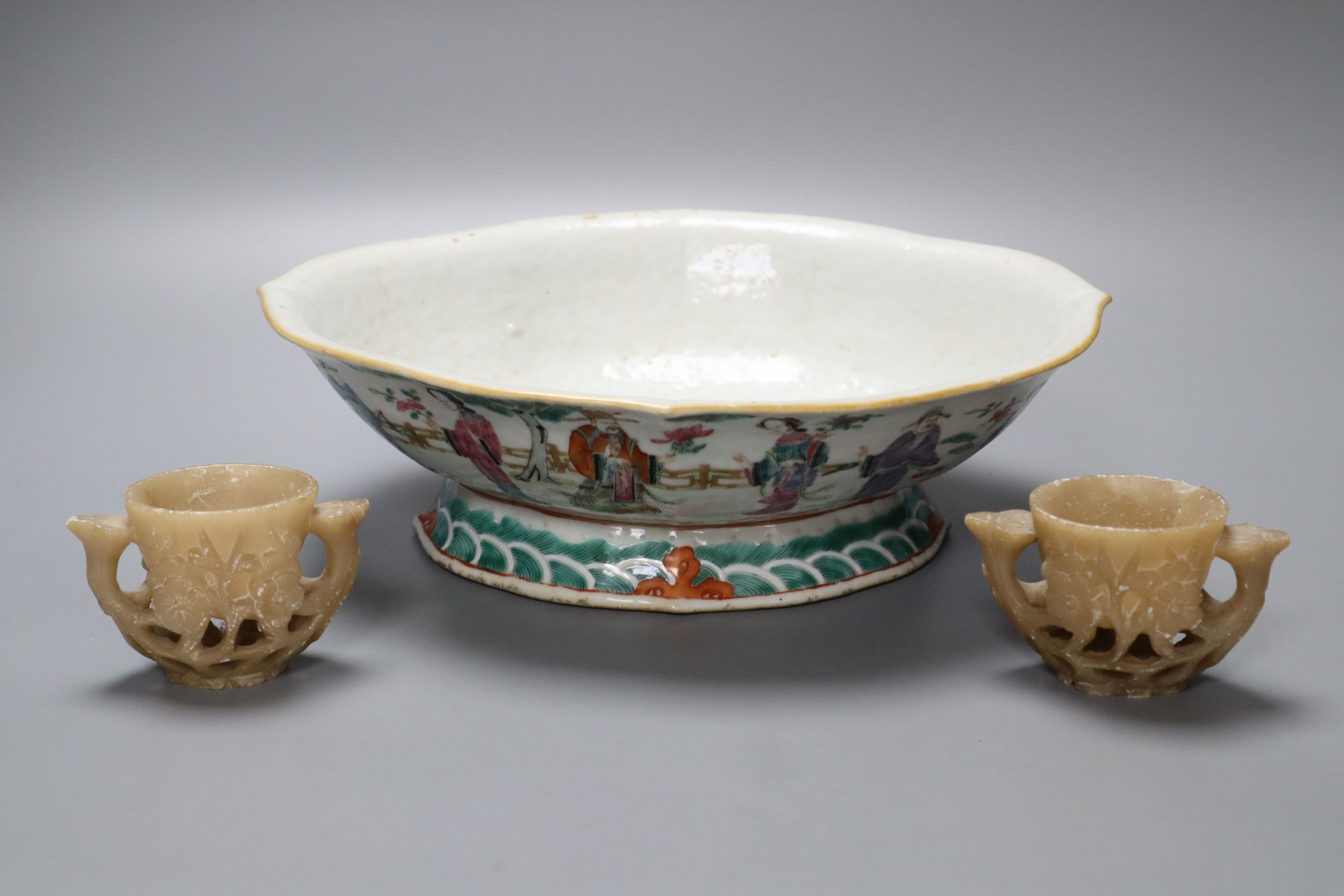 A Chinese dish, length 26cm and two soapstone pots